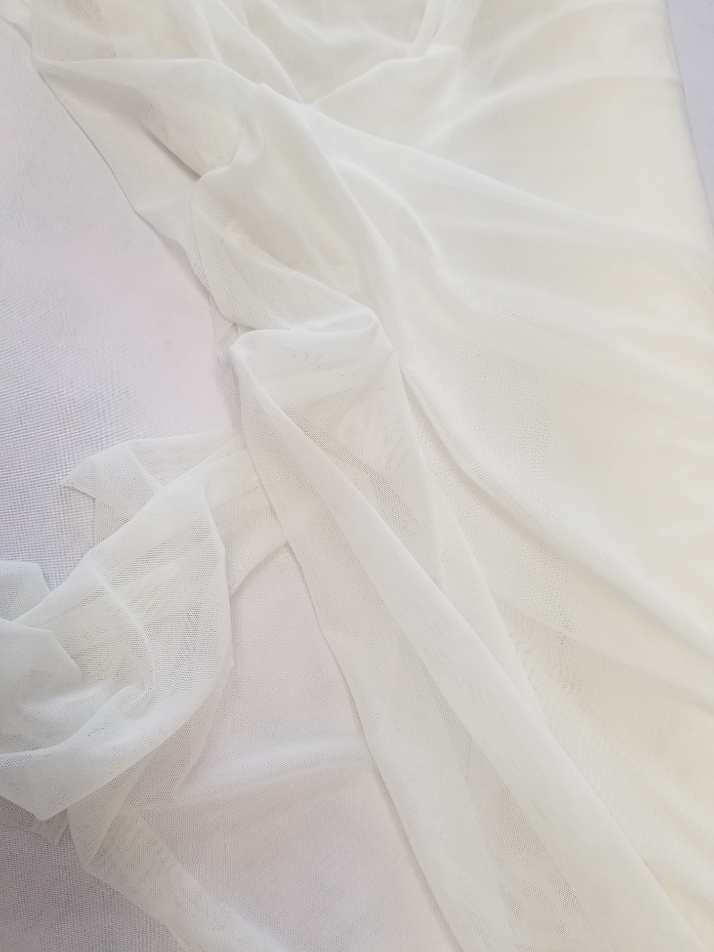 Ivory Power Mesh, 4-way Stretch, Nylon/Spandex 60" Wide, Sells by the Yard, Colors available.