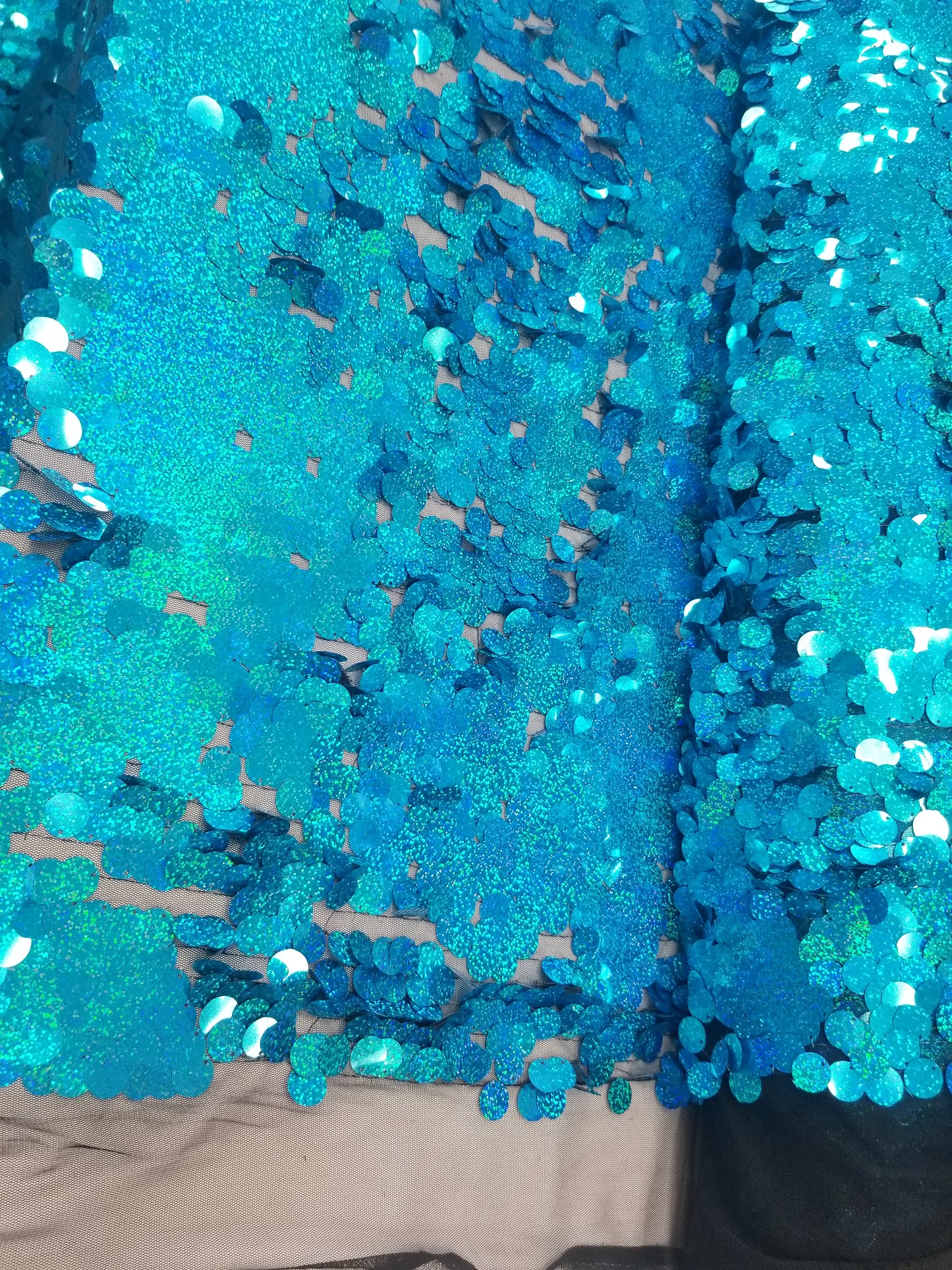 Turquoise Iridescent Jumbo Size Tear Drop Sequins on Stretch Mesh Base 2 Way Stretch 56/57" Sold by the Yard