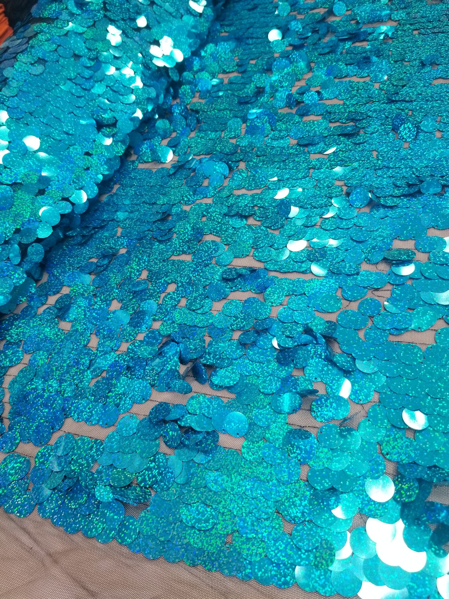 Turquoise Iridescent Jumbo Size Tear Drop Sequins on Stretch Mesh Base 2 Way Stretch 56/57" Sold by the Yard